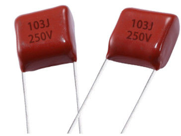 Qualität  Red 0.01 UF Metallized Polyester Film Capacitor Voltage Proof Fabrik