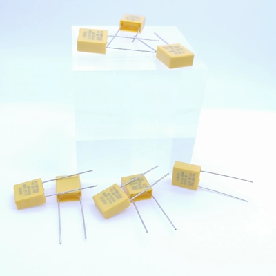 Widerstrebende und kapazitive gelbe Farbe des Druck-Entlastungs-Kondensator-0.1UF 310V P7.5MM
