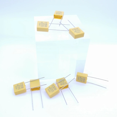 Widerstrebende und kapazitive gelbe Farbe des Druck-Entlastungs-Kondensator-0.1UF 310V P7.5MM
